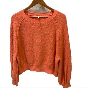 Free People cropped boucle sweatshirt. Bright coral color. Size XS.